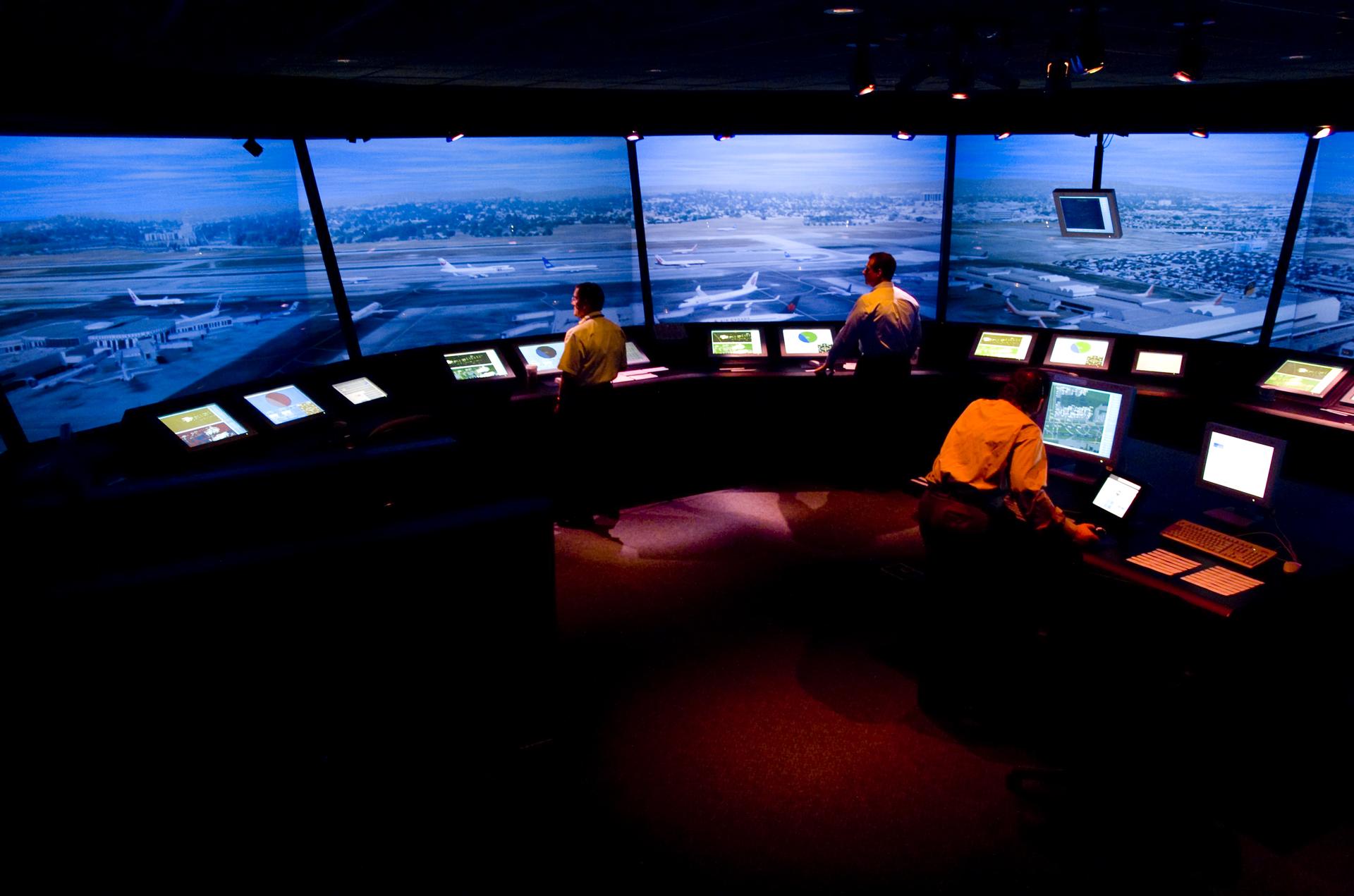 Air traffic controllers test NASA-developed concepts in FutureFlight Central, an ultra-realistic, 360-degree, simulated control