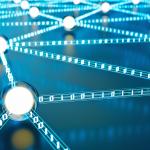 Digital wires connecting at white dots on a bright blue background.