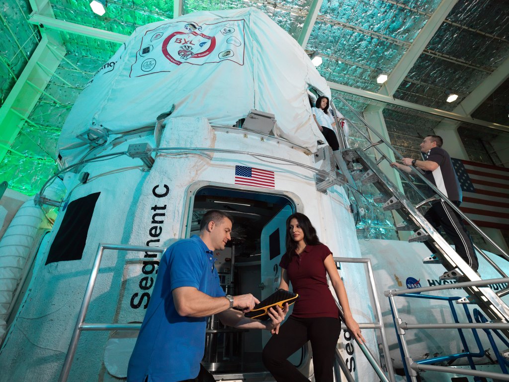 Researchers are pictured outside the Human Exploration Research Analog (HERA), located at NASA's Johnson Space Center. The closed habitat is a unique 650-square-feet space that is split among two floors and a loft, designed to serve as an Earth-bound mission for isolation, confinement, and remote conditions in exploration scenarios.