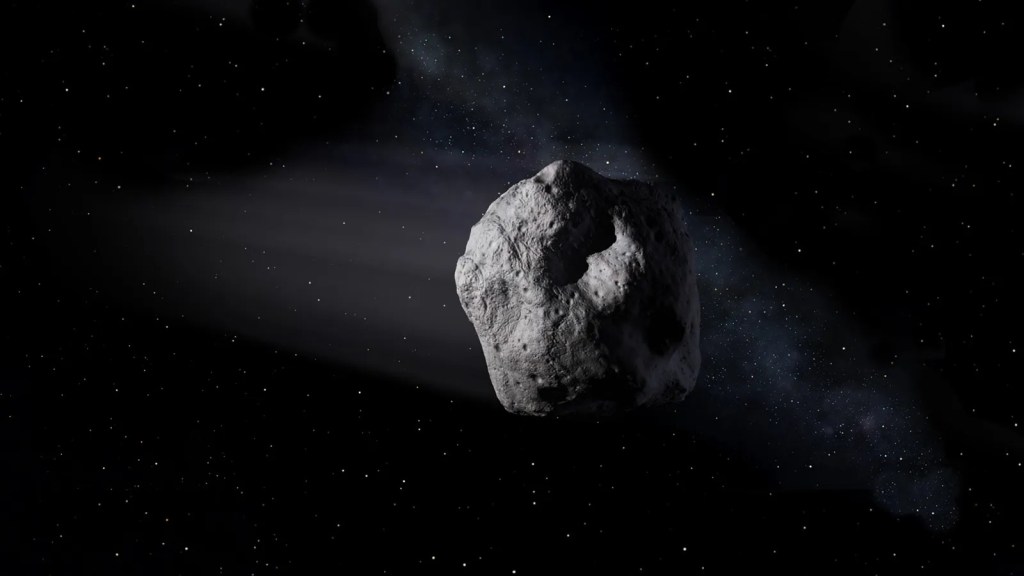 This artist’s concept depicts an asteroid drifting through space