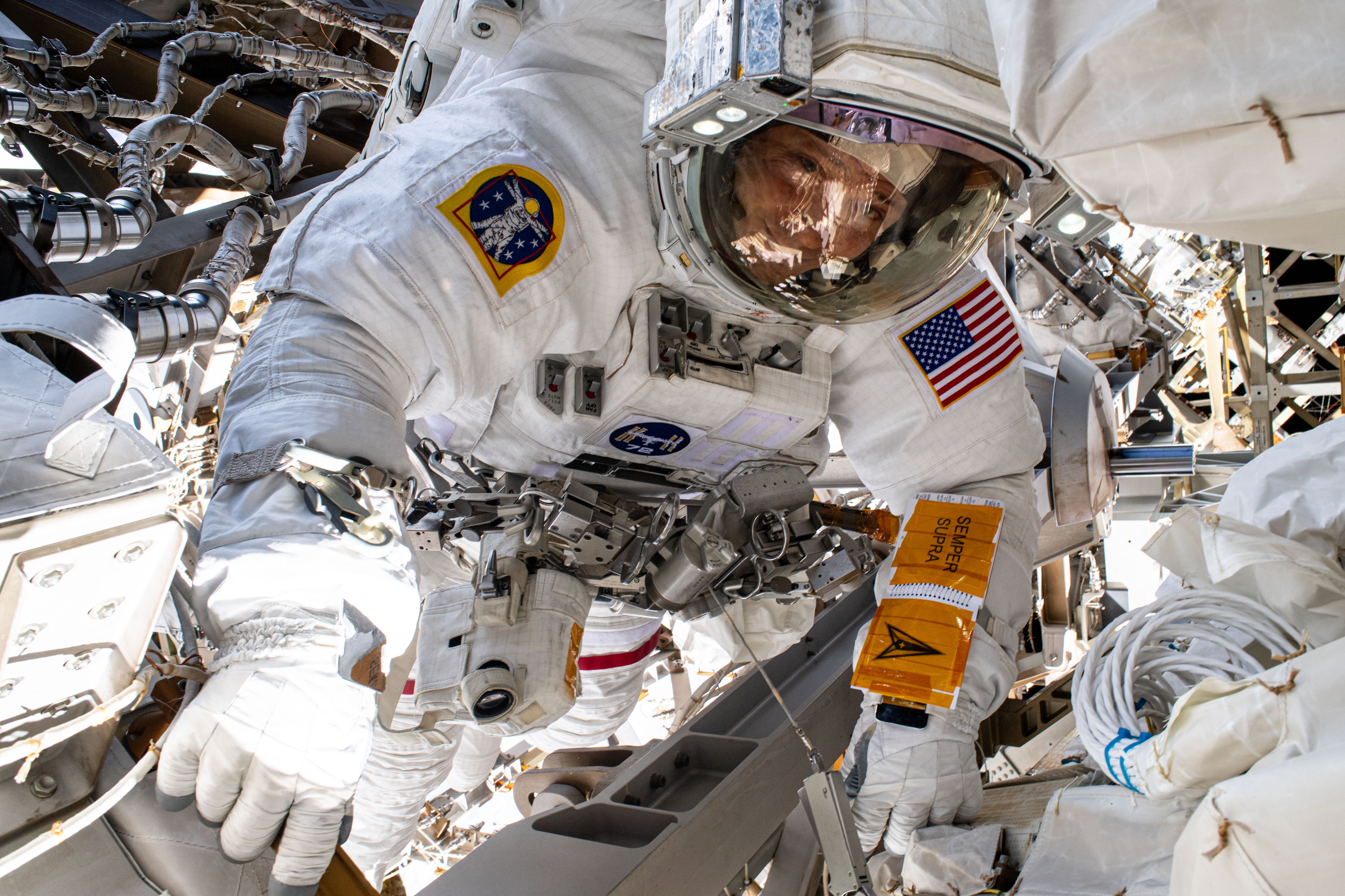 NASA astronaut and Expedition 72 Flight Engineer Nick Hague is pictured during a six-hour spacewalk for science and maintenance on the Internationa...